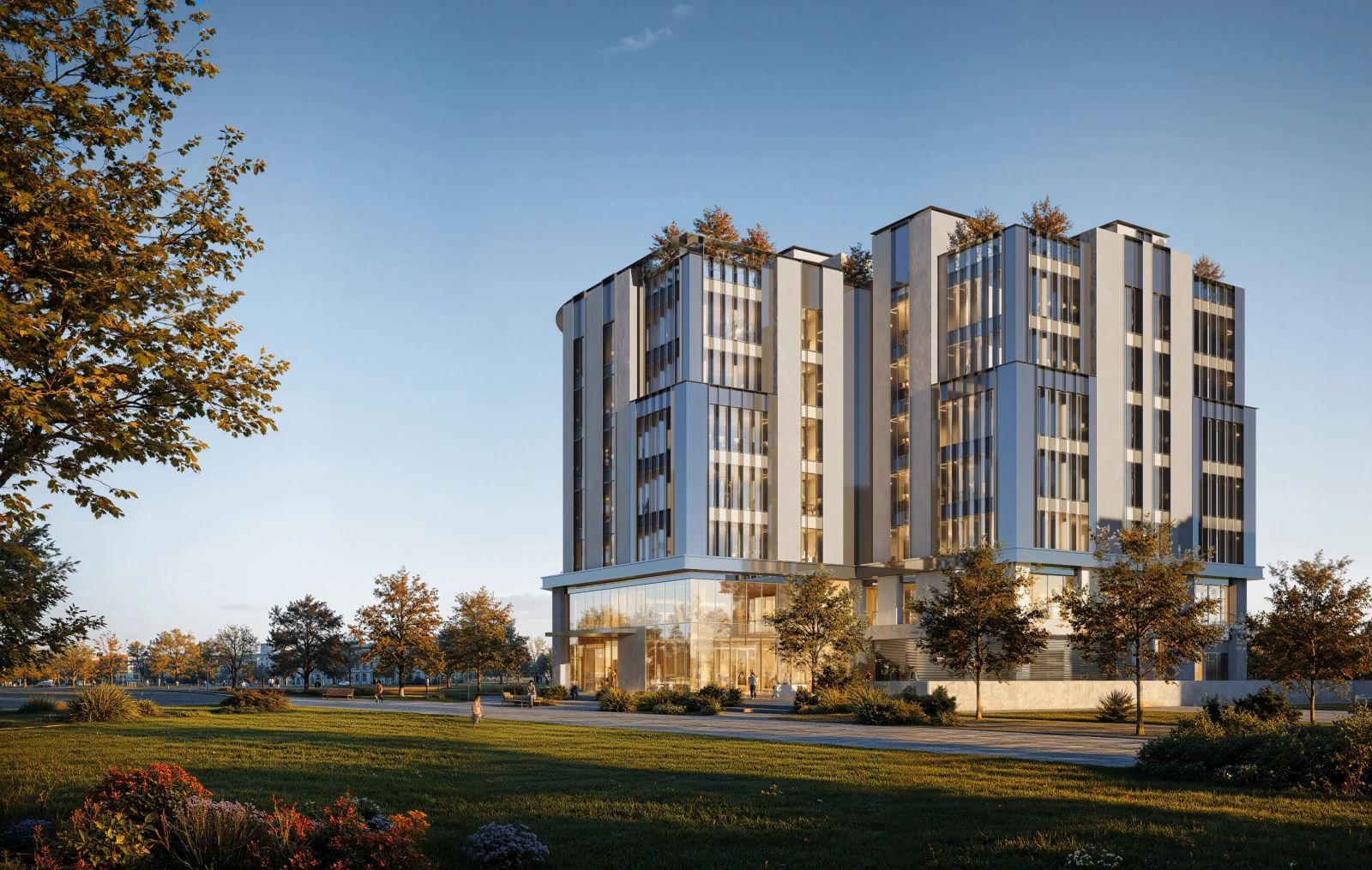 Golden-hour exterior of 24 HC across the lawn
